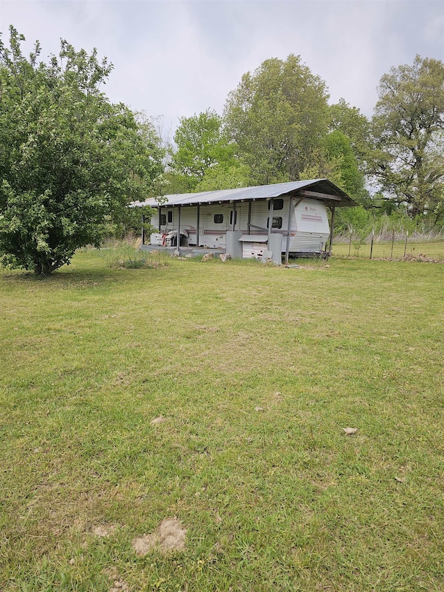 3845 Forked Deer Rd, Gates, TN 38037 - exterior space featuring a lawn and a detached carport