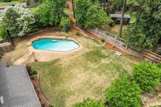 view of pool with a yard, a patio, a fenced in pool, and a fenced backyard