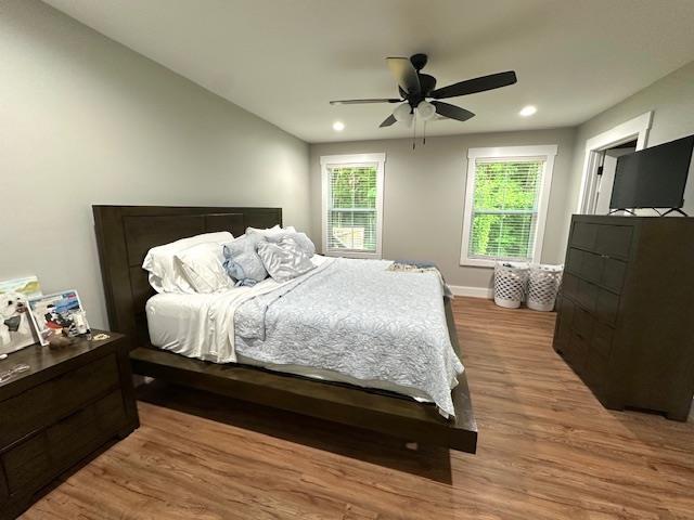 50 Melrose Cv, Savannah, TN 38372 - bedroom featuring recessed lighting, baseboards, a ceiling fan, and wood finished floors