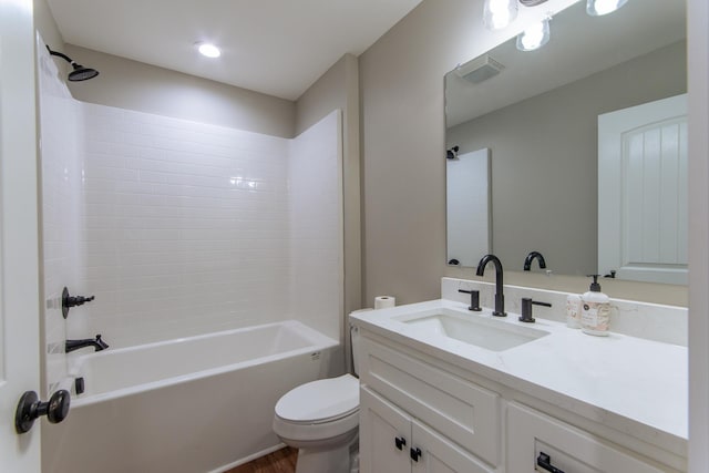 50 Melrose Cv, Savannah, TN 38372 - bathroom featuring toilet, wood finished floors, bathtub / shower combination, visible vents, and vanity