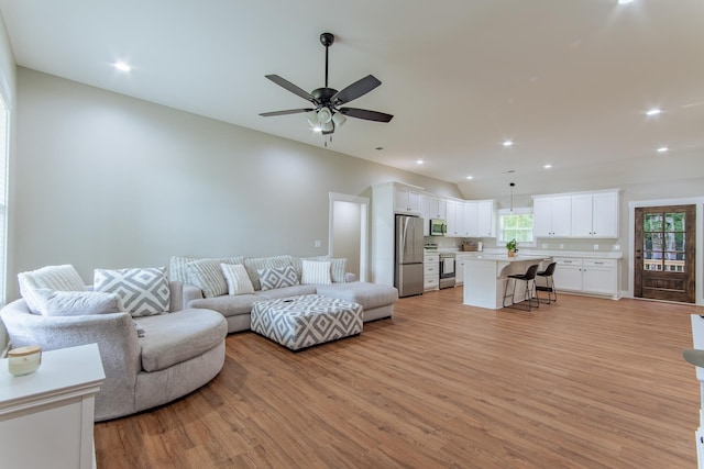 50 Melrose Cv, Savannah, TN 38372 - living area featuring light wood-type flooring, a ceiling fan, and recessed lighting