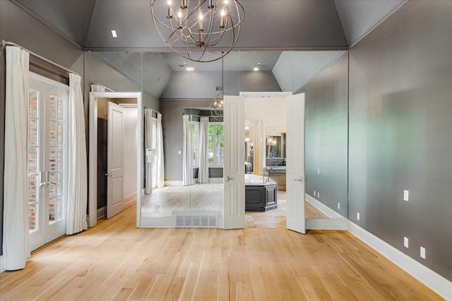 294 Dubray Manor Dr, Collierville, TN 38017 - interior space featuring visible vents, french doors, light wood finished floors, a notable chandelier, and vaulted ceiling