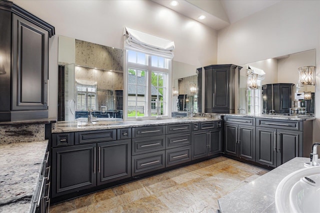 294 Dubray Manor Dr, Collierville, TN 38017 - bathroom featuring double vanity, high vaulted ceiling, walk in shower, and a bath