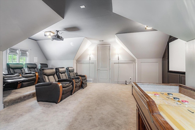 294 Dubray Manor Dr, Collierville, TN 38017 - carpeted home theater room featuring visible vents, a decorative wall, and lofted ceiling
