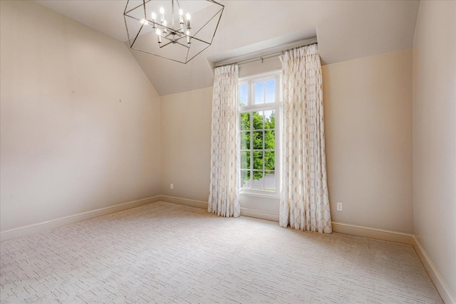 294 Dubray Manor Dr, Collierville, TN 38017 - unfurnished room with an inviting chandelier, baseboards, carpet, and lofted ceiling