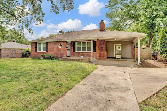 single story home with a front lawn, fence, a chimney, brick siding, and concrete driveway