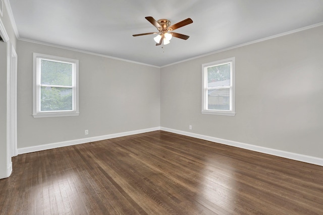 unfurnished room with baseboards, a ceiling fan, wood finished floors, and ornamental molding