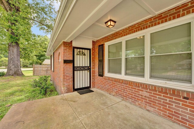 4277 Rhodes Ave, Memphis, TN 38111 - view of exterior entry featuring brick siding