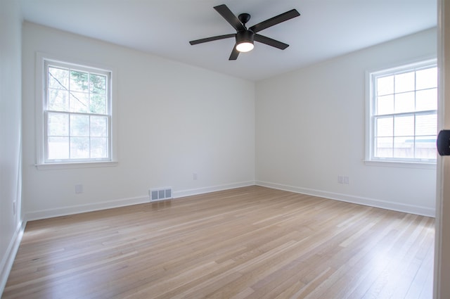 5483 Brantford Rd, Memphis, TN 38120 - unfurnished room featuring baseboards, ceiling fan, light wood-style flooring, and visible vents