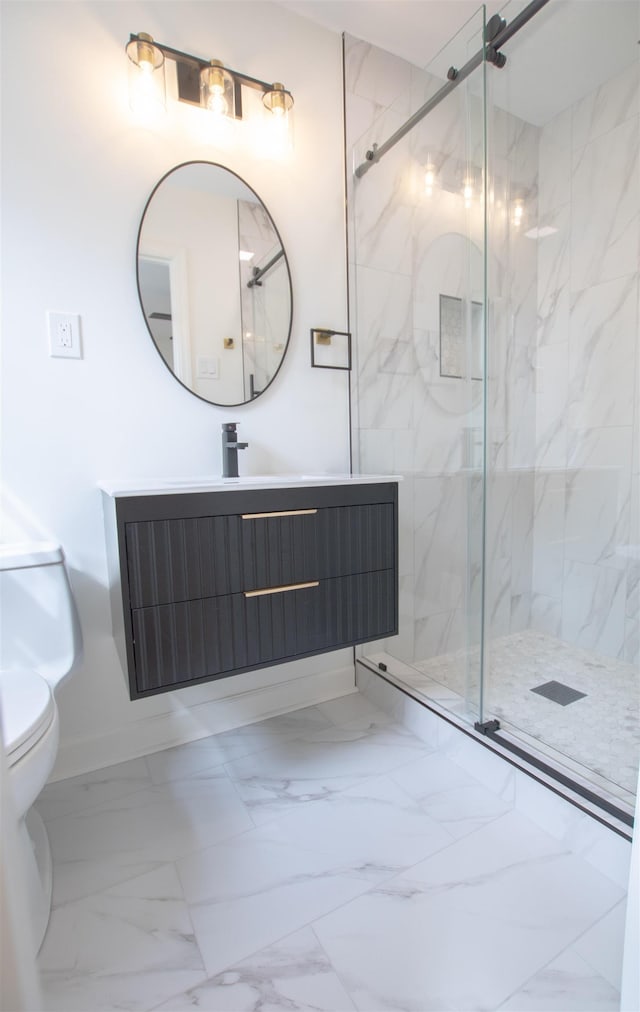 5483 Brantford Rd, Memphis, TN 38120 - full bath with toilet, a marble finish shower, marble finish floor, and vanity
