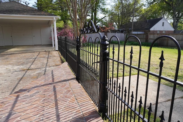 5483 Brantford Rd, Memphis, TN 38120 - view of gate with fence and a lawn