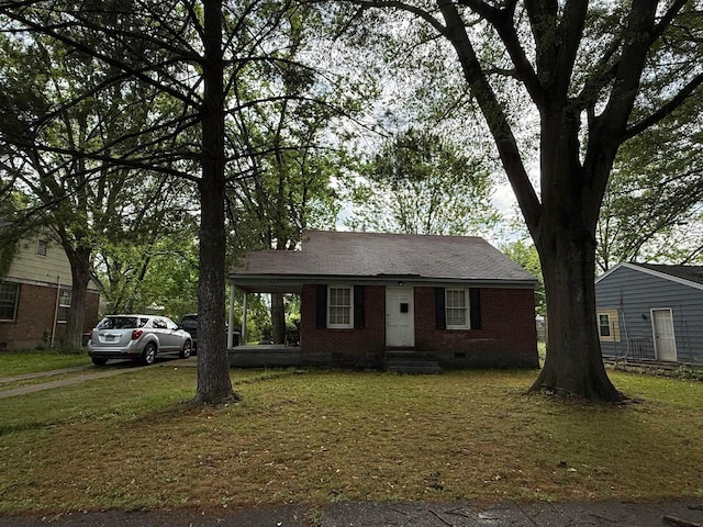 ranch-style house with brick siding, crawl space, and a front yard