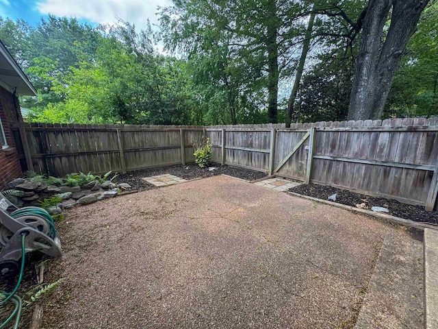 1439 Woodston Rd, Memphis, TN 38117 - view of patio featuring a fenced backyard
