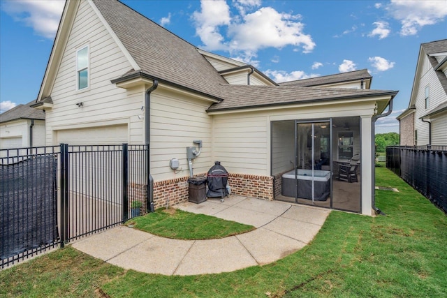 330 Mary Taylor Way, Piperton, TN 38017 - rear view of house featuring a sunroom, roof with shingles, a patio, and brick siding