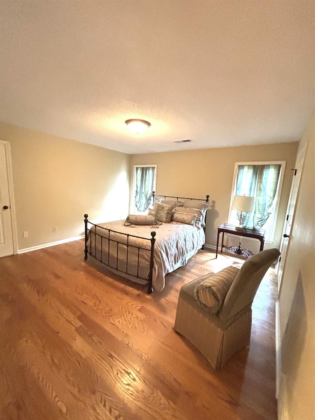10202 Wynmanor Dr, Collierville, TN 38017 - bedroom with wood finished floors and baseboards