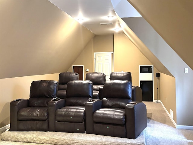 10202 Wynmanor Dr, Collierville, TN 38017 - carpeted home theater room featuring baseboards and lofted ceiling