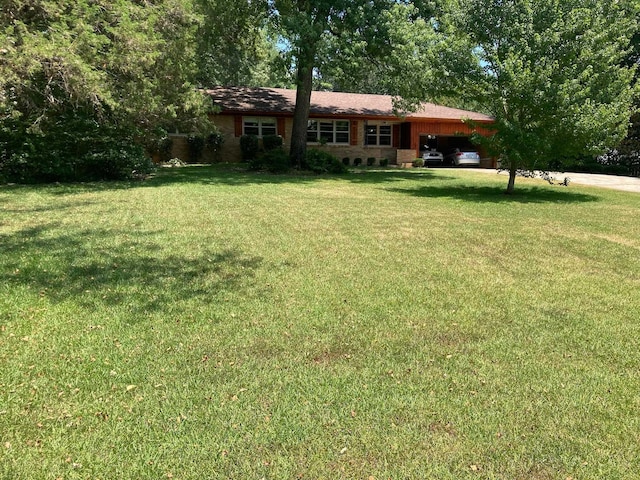 1818 Hayden Rd, Germantown, TN 38138 - view of grassy yard featuring a carport
