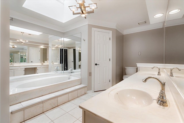 bathroom featuring an inviting chandelier, ornamental molding, double vanity, a bath, and a sink