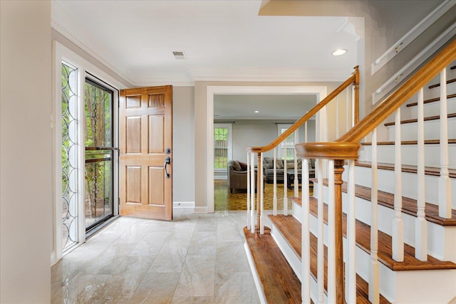 entrance foyer featuring crown molding, recessed lighting, baseboards, and stairway
