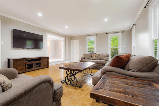 living area featuring baseboards, ornamental molding, and recessed lighting