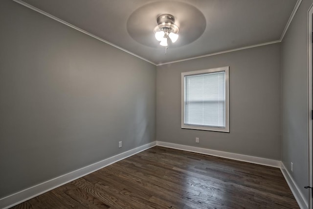 empty room with baseboards, ornamental molding, dark wood-style floors, and ceiling fan