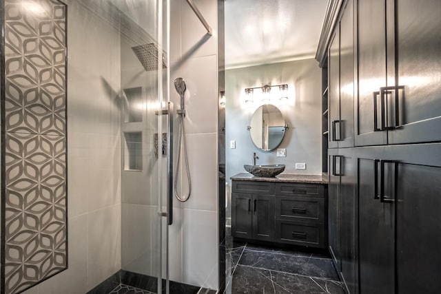 full bathroom featuring vanity and a shower stall