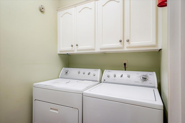 819 N Tree Dr, Collierville, TN 38017 - laundry room featuring cabinet space and washer and clothes dryer