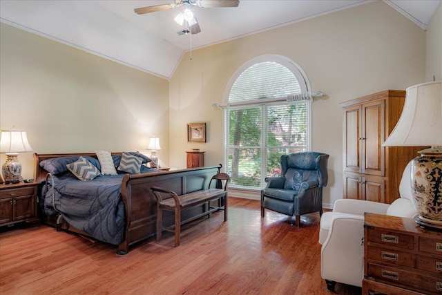 819 N Tree Dr, Collierville, TN 38017 - bedroom with high vaulted ceiling, multiple windows, ceiling fan, and light wood finished floors