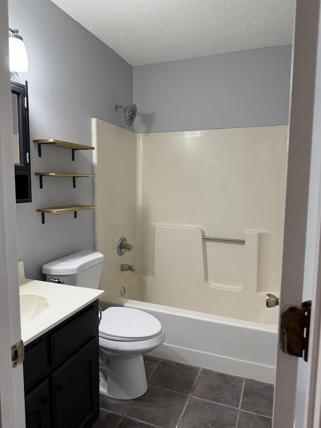 full bath with toilet, a textured ceiling, tub / shower combination, and vanity