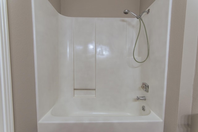 full bath featuring shower / bathtub combination