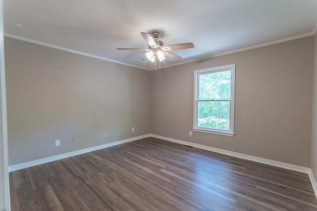 unfurnished room featuring crown molding, baseboards, ceiling fan, and dark wood-type flooring