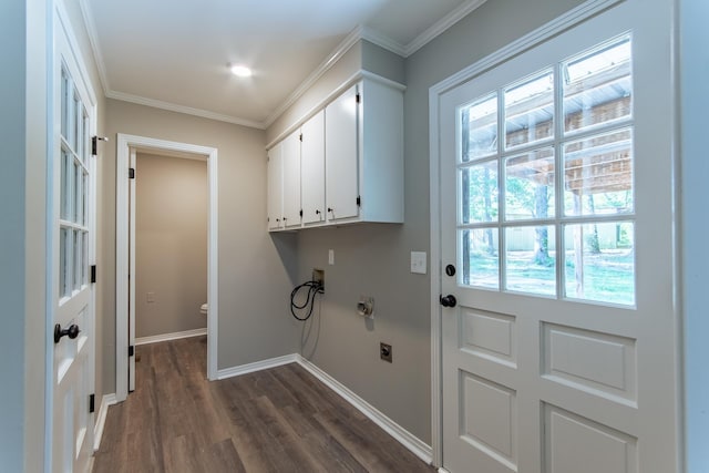 clothes washing area with cabinet space, dark wood finished floors, electric dryer hookup, baseboards, and ornamental molding