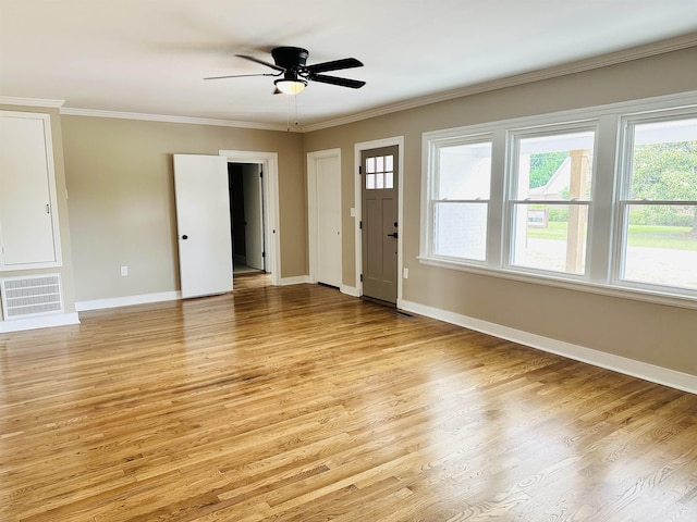 424 Tipton St S, Munford, TN 38058 - interior space featuring crown molding, visible vents, and light wood finished floors