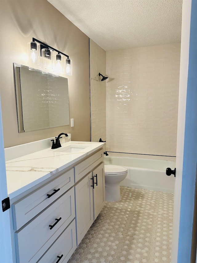 424 Tipton St S, Munford, TN 38058 - bathroom with shower / bath combination, a textured ceiling, toilet, and vanity