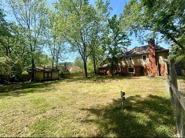 view of yard with fence