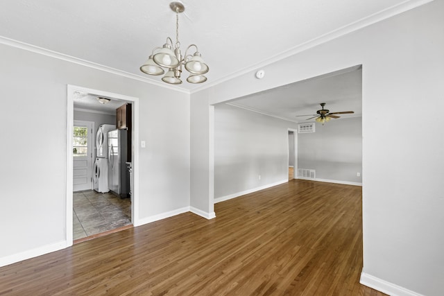 unfurnished dining area with visible vents, ornamental molding, and wood finished floors