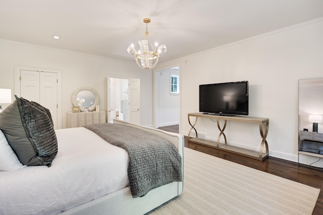 bedroom with crown molding, wood finished floors, baseboards, recessed lighting, and a chandelier