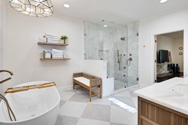full bath featuring crown molding, a freestanding tub, a stall shower, baseboards, and recessed lighting