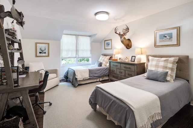 bedroom with vaulted ceiling