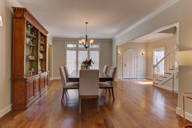 dining room featuring baseboards, dark wood-style flooring, stairs, and a notable chandelier