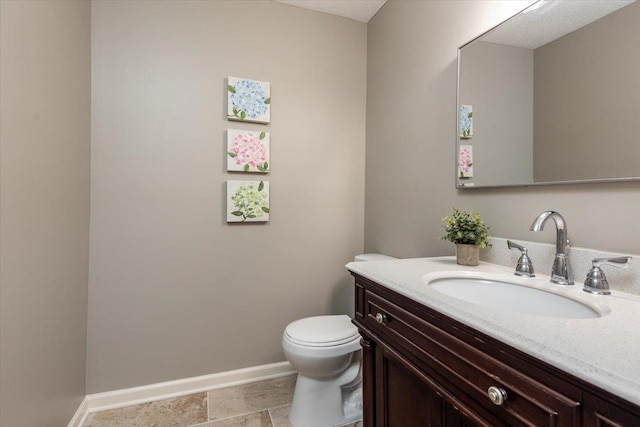 1309 Brookside Dr, Germantown, TN 38138 - bathroom featuring vanity, baseboards, and toilet