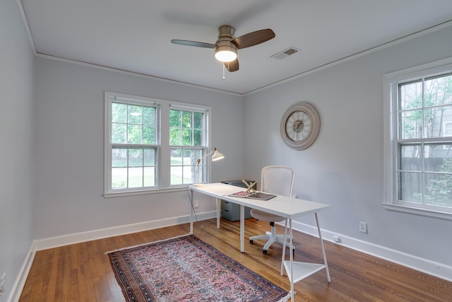 office space with a healthy amount of sunlight, baseboards, a ceiling fan, and wood finished floors