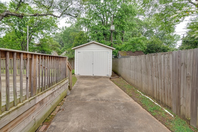 view of shed with a fenced backyard