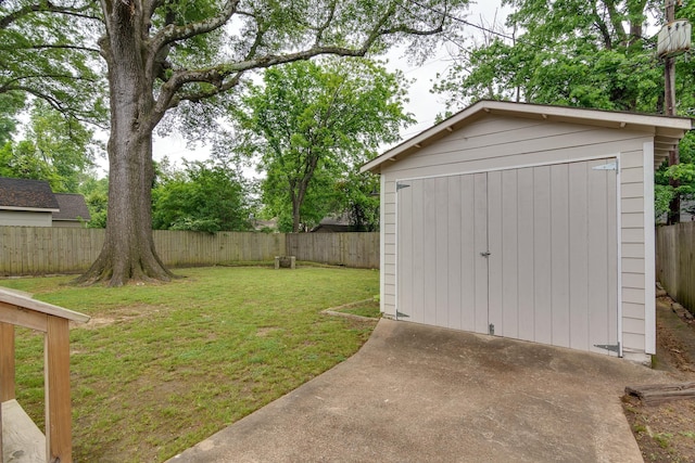 view of shed featuring a fenced backyard