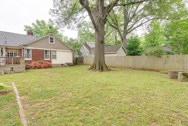 view of yard with fence