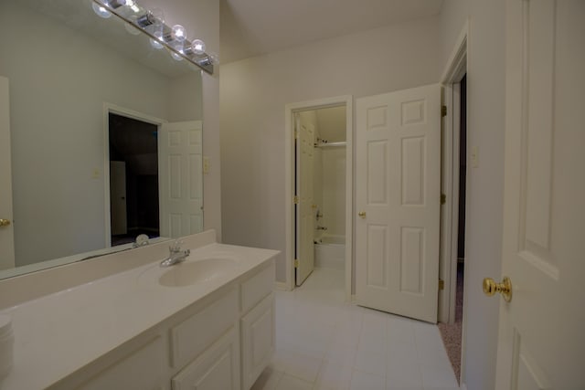 bathroom with vanity, tile patterned flooring, and tub / shower combination