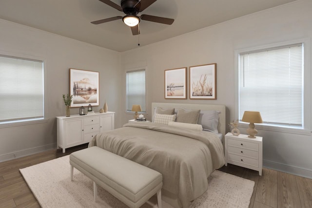 4771 Sea Isle Rd, Memphis, TN 38117 - bedroom with baseboards, ceiling fan, ornamental molding, and wood finished floors