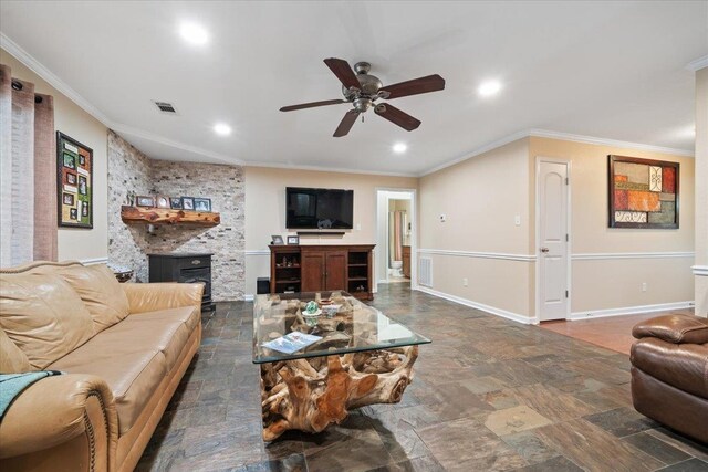 living area with visible vents, ornamental molding, ceiling fan, recessed lighting, and stone finish flooring