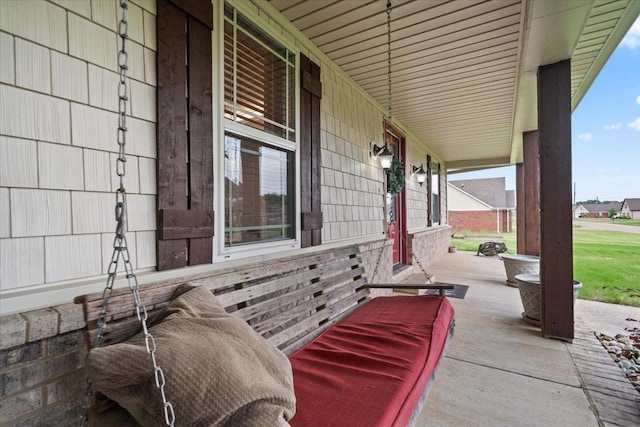 view of patio featuring a porch