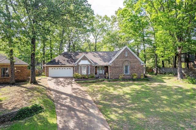 ranch-style house with brick siding, fence, a front lawn, concrete driveway, and an attached garage